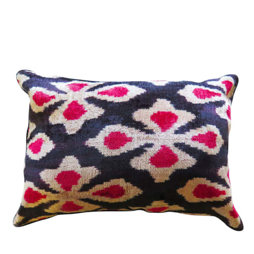 Coussin en velours Ikat rose yeux design