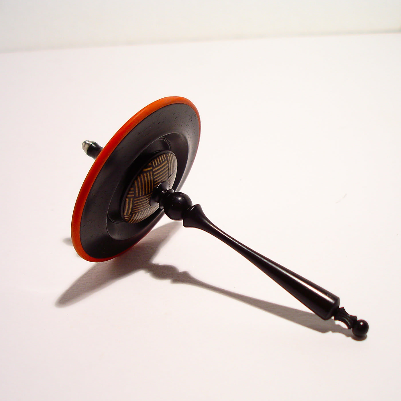 Spinning Top in Ebony with Maple and Erable Inlays Mauro Sarti | Artemest