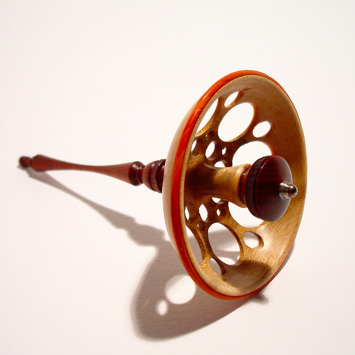 Aria Spinning Top in Maple and Muirapiranga Mauro Sarti | Artemest